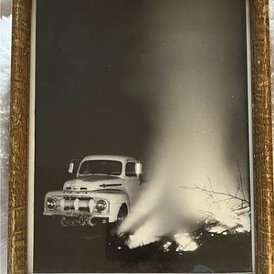 Photo old Chevy truck by bonfire